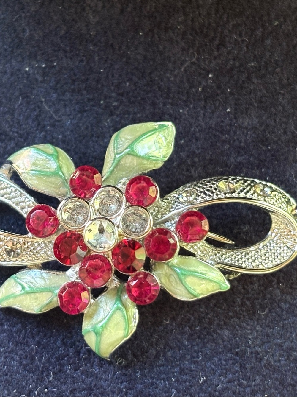 Silver Floral Brooch with Red Crystal Accents